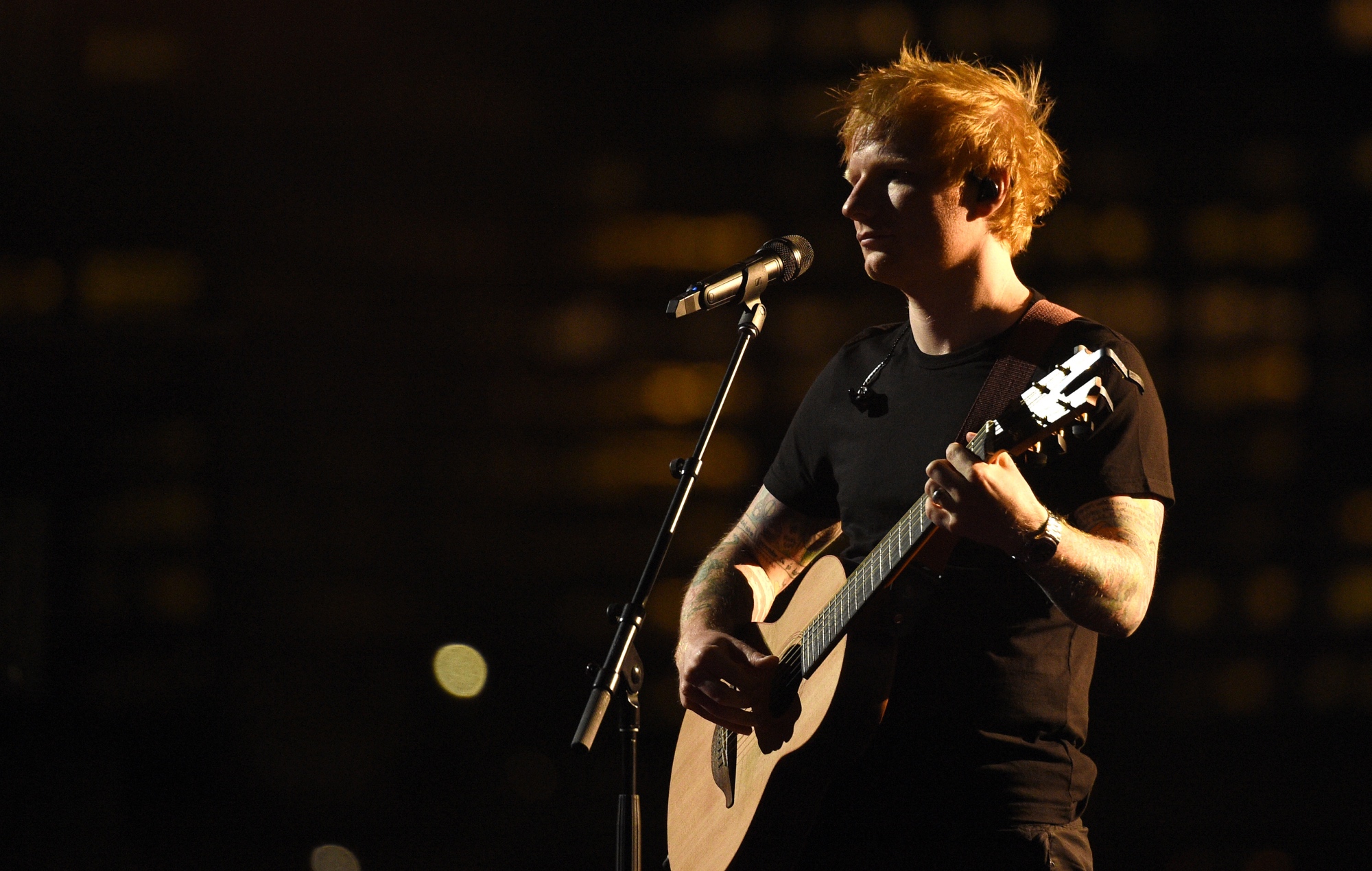 Ed Sheeran performing live onstage in 2021