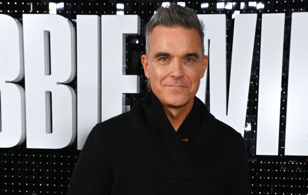robbie-williams-opens-up-about-past-self-harming:-“it-was-sad-–-i-had-no-resistance”
