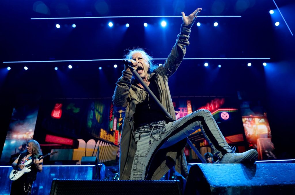iron-maiden’s-manager-renews-plea-for-limited-phone-use-during-gigs:-‘i-wish-you-nothing-but-a-very-sore arm’