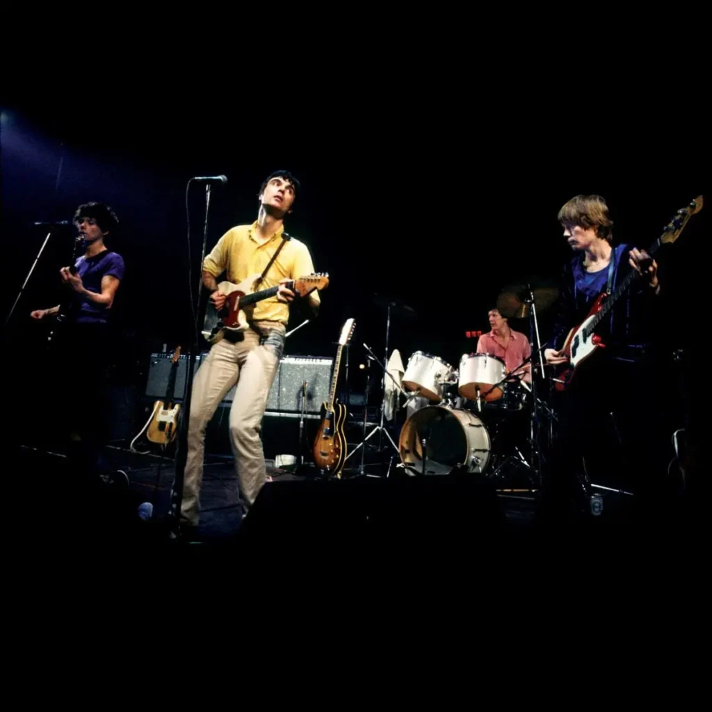 “how-did-we-get-here?”:-talking-heads-tease-50th-anniversary-date,-stir-reunion-rumors